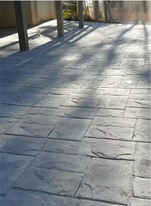 Stamped Concrete vs. Pavers: Why It’s the Smarter Choice for Walkways