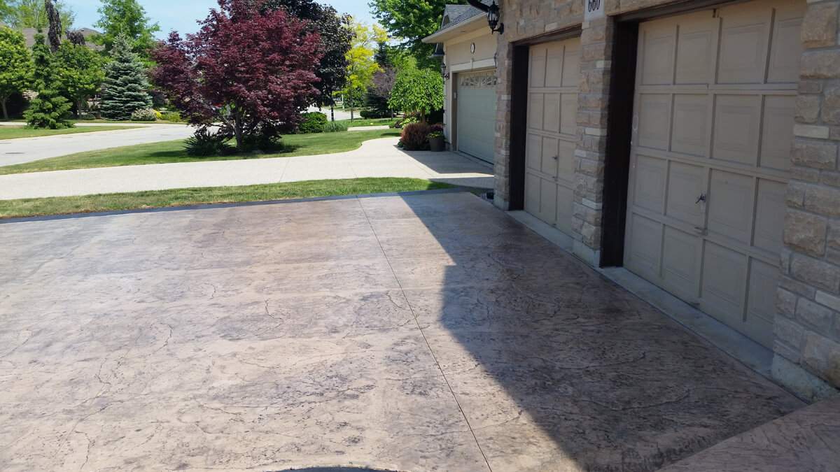 Stamped Concrete vs Pavers: The Best Choice for Your Driveway