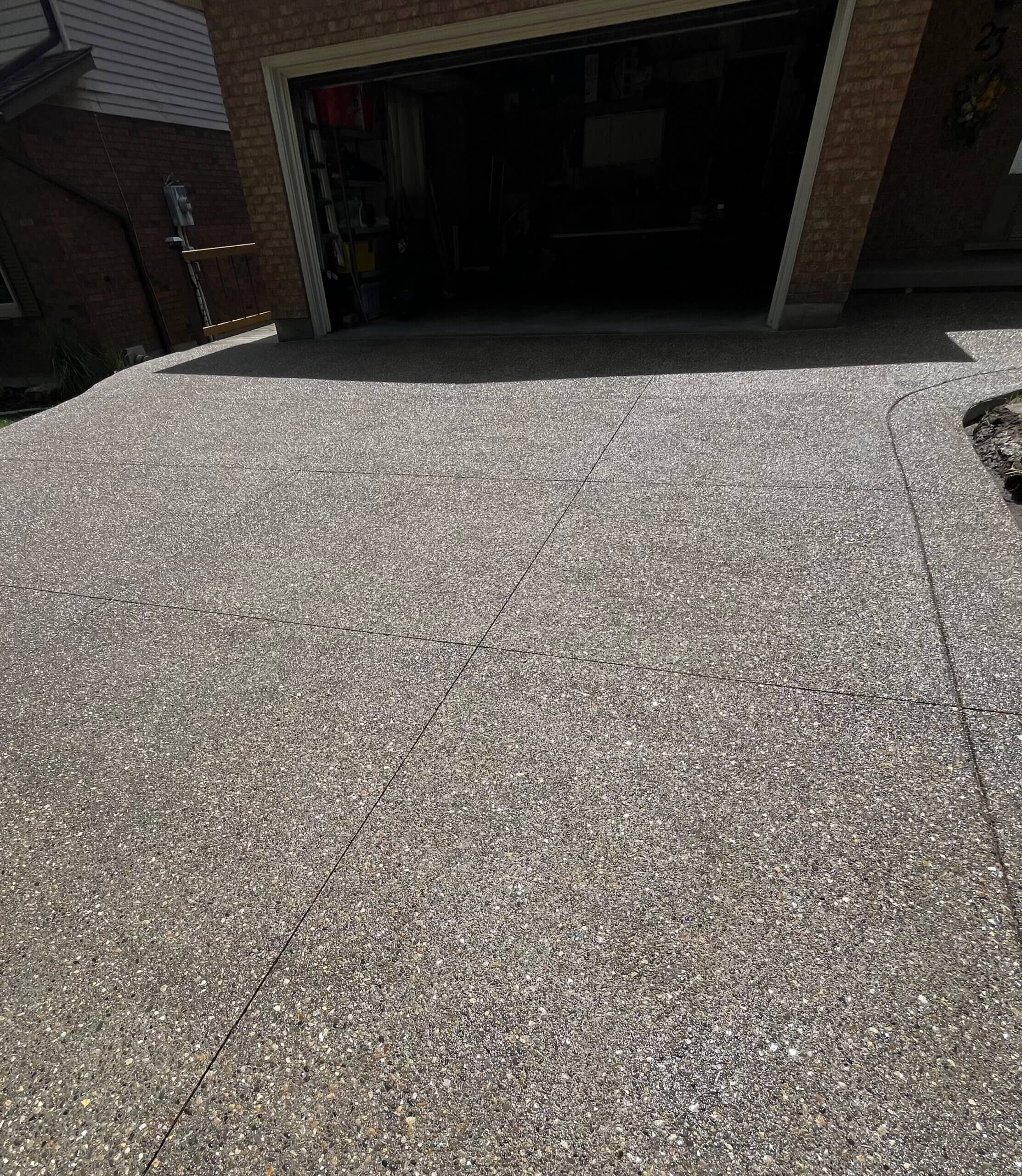 Exposed aggregate concrete driveway in Dundas, Ontario - Mike's Concrete